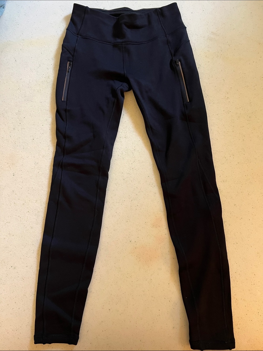 Athleta Black, fleece lined, TALL size M with Logo on back
